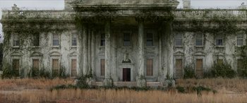 Movie still from “Zombieland: Double Tap” (2019), directed by Ruben Fleischer – An old building with pillars and a statue of a woman; Extreme Wide shot, Low angle