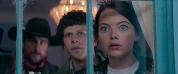 Movie still from “Zombieland: Double Tap” (2019), directed by Ruben Fleischer – A man and a woman looking at the camera; Close Up shot, Over the shoulder angle