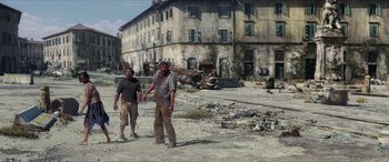 Movie still from “Zombieland: Double Tap” (2019), directed by Ruben Fleischer – Two men are standing in the middle of an abandoned town; Wide shot, High angle