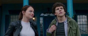 Movie still from “Zombieland: Double Tap” (2019), directed by Ruben Fleischer – A man and a woman standing next to each other outside; Close Up shot, Over the shoulder angle