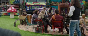 Movie still from “Zombieland: Double Tap” (2019), directed by Ruben Fleischer – A group of people sitting around in a circle; Wide shot, High angle