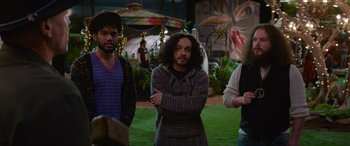 Movie still from “Zombieland: Double Tap” (2019), directed by Ruben Fleischer – A group of men standing next to each other; Medium shot, Over the shoulder angle