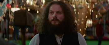 Movie still from “Zombieland: Double Tap” (2019), directed by Ruben Fleischer – A man with long hair and a beard; Close Up shot, Low angle