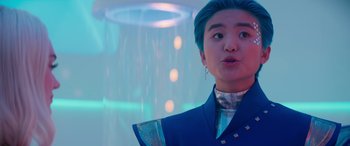 Movie still from “Zombies 3” (2022), directed by Paul Hoen – A person with a blue hair and a blue jacket; Close Up shot, Low angle