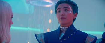 Movie still from “Zombies 3” (2022), directed by Paul Hoen – A man with blue hair is looking at the camera; Close Up shot, Low angle