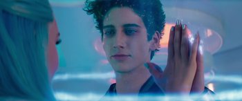 Movie still from “Zombies 3” (2022), directed by Paul Hoen – A young man is looking out of a window; Close Up shot, Over the shoulder angle