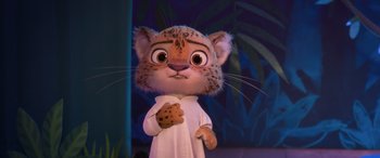 Movie still from “Zootopia” (2016), directed by Jared Bush – A cat character is standing in front of a wall; Medium shot, Low angle