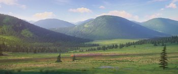 Movie still from “Zootopia” (2016), directed by Jared Bush – A train traveling through a lush green valley; Extreme Wide shot, High angle