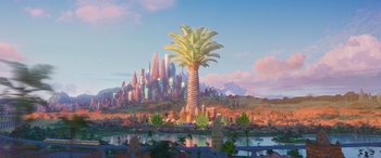 Movie still from “Zootopia” (2016), directed by Jared Bush – A large palm tree in the middle of a city; Extreme Wide shot, Low angle