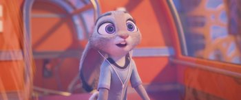 Movie still from “Zootopia” (2016), directed by Jared Bush – A rabbit with headphones is listening to music; Close Up shot, Over the shoulder angle