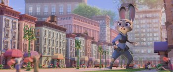 Movie still from “Zootopia” (2016), directed by Jared Bush – An image of an animated character in a city setting; Wide shot, Low angle