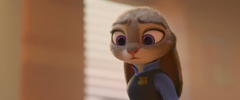 Movie still from “Zootopia” (2016), directed by Jared Bush – A character from zootropolis; Close Up shot, Over the shoulder angle