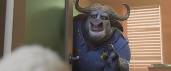 Movie still from “Zootopia” (2016), directed by Jared Bush – An animal that is wearing a uniform; Medium shot, Over the shoulder angle