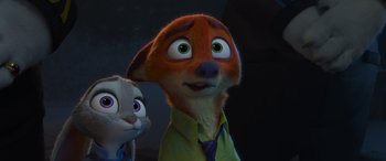 Movie still from “Zootopia” (2016), directed by Jared Bush – A couple of people standing next to each other in a room; Close Up shot, High angle
