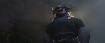 Movie still from “Zootopia” (2016), directed by Jared Bush – An animated character is wearing a uniform and horns; Medium shot, Low angle