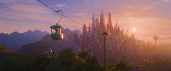 Movie still from “Zootopia” (2016), directed by Jared Bush – A cable car is going down a hill in a city; Extreme Wide shot, Low angle