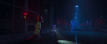 Movie still from “Zootopia” (2016), directed by Jared Bush – A couple of people standing next to each other on a street; Wide shot, Over the shoulder angle