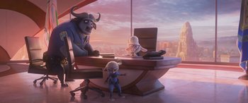 Movie still from “Zootopia” (2016), directed by Jared Bush – A group of people sitting at a table; Wide shot, Low angle
