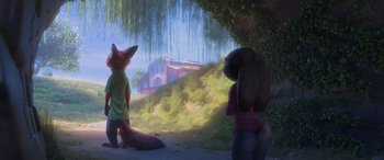 Movie still from “Zootopia” (2016), directed by Jared Bush – A couple of people standing next to each other on top of a field; Wide shot, Over the shoulder angle