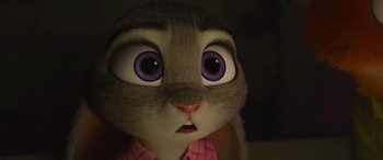 Movie still from “Zootopia” (2016), directed by Jared Bush – A rabbit's face with purple eyes; Close Up shot, High angle