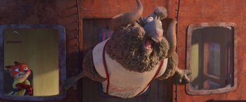 Movie still from “Zootopia” (2016), directed by Jared Bush – An overhead view of a stuffed animal with a shirt on; Medium shot, Overhead angle
