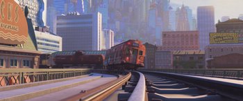 Movie still from “Zootopia” (2016), directed by Jared Bush – A train traveling down a train track next to a city; Extreme Wide shot, Low angle