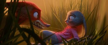 Movie still from “Zootopia” (2016), directed by Jared Bush – An animated scene of a woman and a red creature; Close Up shot, Over the shoulder angle