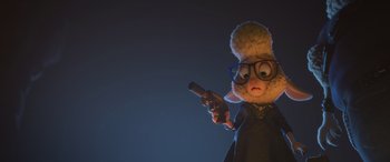 Movie still from “Zootopia” (2016), directed by Jared Bush – A person holding a gun in a dark room; Medium shot, Low angle