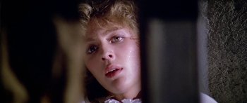 Movie still from “1990: The Bronx Warriors” (1982), directed by Enzo G. Castellari – A person with wet hair looking at the camera; Close Up shot, Low angle