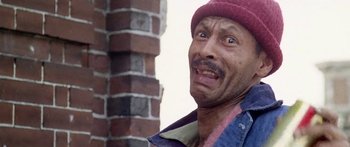 Movie still from “1990: The Bronx Warriors” (1982), directed by Enzo G. Castellari – A person wearing a hat; Close Up shot, Low angle