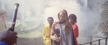 Movie still from “1990: The Bronx Warriors” (1982), directed by Enzo G. Castellari – A group of people standing next to each other; Medium shot, Low angle