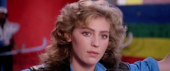 Movie still from “1990: The Bronx Warriors” (1982), directed by Enzo G. Castellari – A person wearing a blue shirt; Close Up shot, Low angle