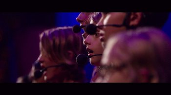 Movie still from “20,000 Days on Earth” (2014), directed by Iain Forsyth – A group of people with microphones in their ears; Close Up shot, Low angle