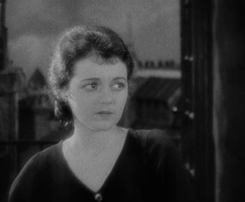 Movie still from “7th Heaven” (1927), directed by Frank Borzage – An old black and white photo of a woman; Close Up shot, High angle