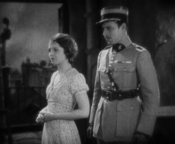 Movie still from “7th Heaven” (1927), directed by Frank Borzage – A man and a woman standing next to each other; Medium shot, High angle