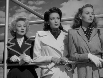 Movie still from “A Letter to Three Wives” (1949), directed by Joseph L. Mankiewicz – A group of women standing next to each other; Medium shot, Low angle