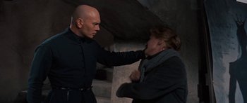 Movie still from “Anastasia” (1956), directed by Anatole Litvak – A man and a woman are fighting in a tunnel; Medium shot, Over the shoulder angle