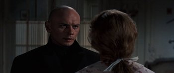 Movie still from “Anastasia” (1956), directed by Anatole Litvak – A man and a woman looking at one another; Close Up shot, Over the shoulder angle