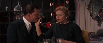 Movie still from “Anastasia” (1956), directed by Anatole Litvak – A man and a woman sitting at a dinner table; Close Up shot, Over the shoulder angle