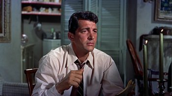 Movie still from “Artists and Models” (1955), directed by Frank Tashlin – A person wearing a shirt and tie; Close Up shot, Low angle