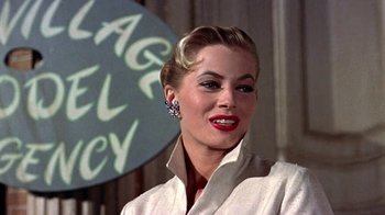 Movie still from “Artists and Models” (1955), directed by Frank Tashlin – A person wearing a white jacket; Close Up shot, Low angle
