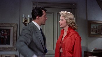 Movie still from “Artists and Models” (1955), directed by Frank Tashlin – A man and a woman talking to each other; Medium shot, Low angle