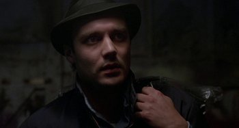 Movie still from “Babylon” (1980), directed by Franco Rosso – A person wearing a hat; Close Up shot, Low angle