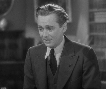 Movie still from “Bad Girl” (1931), directed by Frank Borzage – A man in a suit and tie looking to his left; Close Up shot, High angle