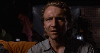 Movie still from “Body Double” (1984), directed by Brian De Palma – A person with long hair; Close Up shot, Low angle