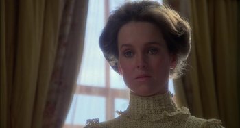 Movie still from “Butch and Sundance: The Early Days” (1979), directed by Richard Lester – A person wearing a sweater; Close Up shot, Low angle