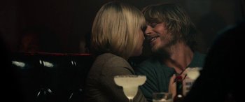 Movie still from “Celeste & Jesse Forever” (2012), directed by Lee Toland Krieger – A man and a woman kissing in front of a bar; Close Up shot, Over the shoulder angle