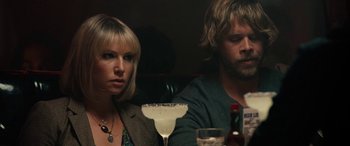 Movie still from “Celeste & Jesse Forever” (2012), directed by Lee Toland Krieger – A man and a woman sitting next to each other at a table; Close Up shot, Over the shoulder angle