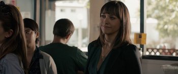 Movie still from “Celeste & Jesse Forever” (2012), directed by Lee Toland Krieger – A woman standing next to a man in a room; Close Up shot, Over the shoulder angle