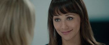 Movie still from “Celeste & Jesse Forever” (2012), directed by Lee Toland Krieger – A woman's face with green eyes; Close Up shot, Over the shoulder angle